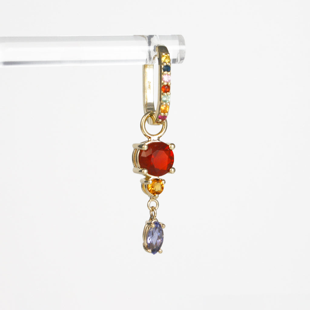 Unique earring charm featuring an exquisite iolite hanging from a lively citrine and a deep orange-red hue Mexican fire opal. Exciting combination of gemstones and shapes that contrast beautifully.