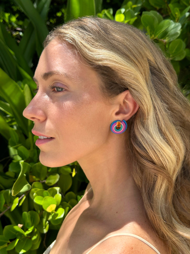 Inspired by the Universe and its infinite mysteries, these exquisite one-of-a-kind earrings are carefully made by hand, with attention to every step of the process. They consist of black walnut, which is treated to make it stronger and more resistant, and delicately hand-painted with top-quality acrylic paint. Mexican orange crystal opals are set in 14k yellow gold, making them eye-catching and unique.