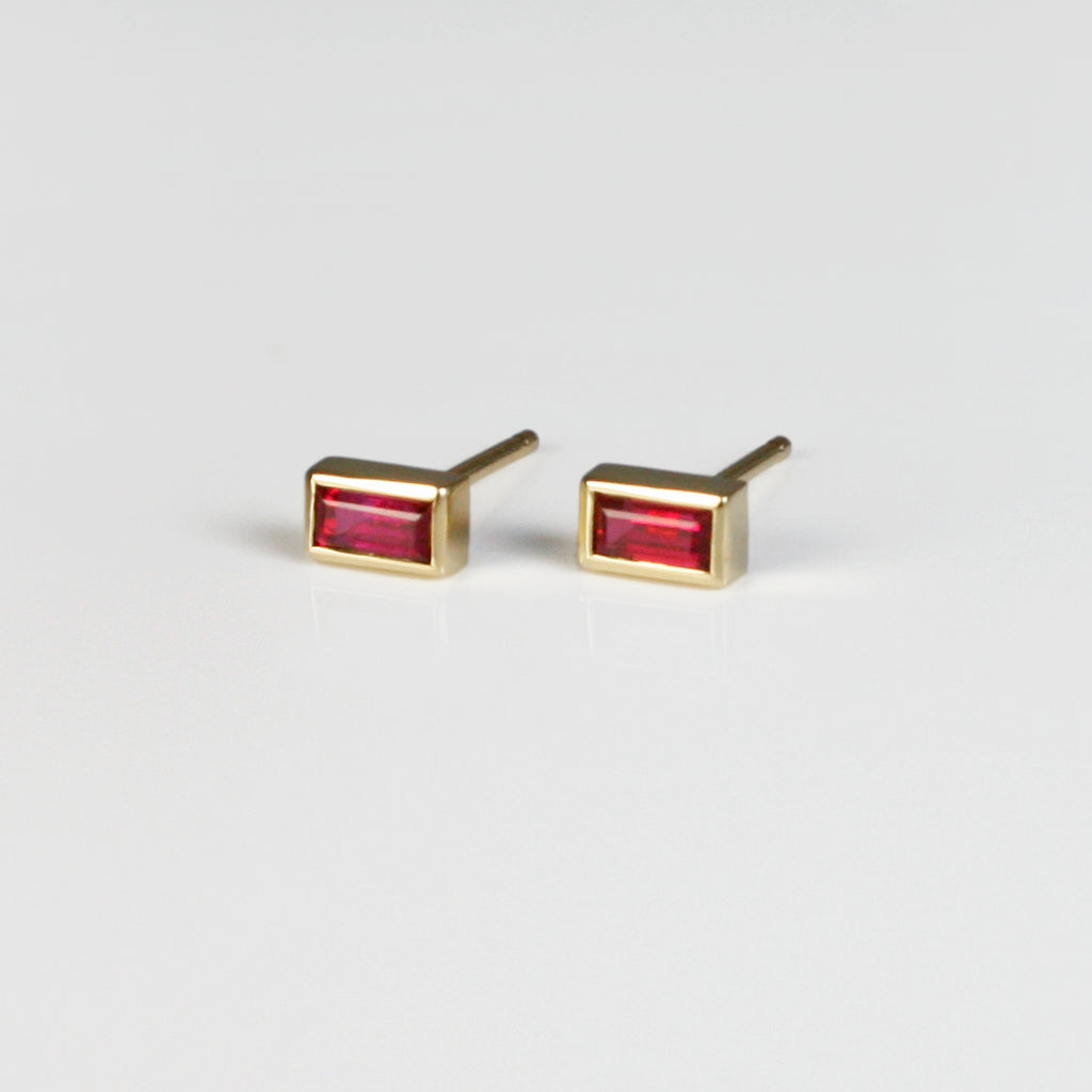 This dainty ruby baguette stud is perfect for your ear stack, as well as for an understated everyday look.
