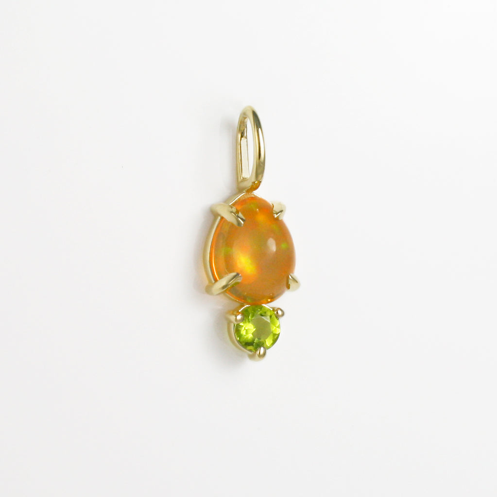 Vibrant Mexican orange crystal opal with green-yellow fire that matches the lively peridot. 